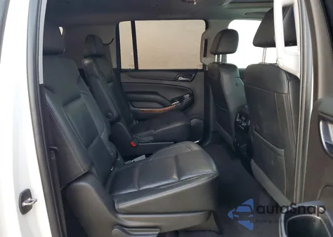 2019 Chevrolet Suburban C1500 Premier z USA, uszkodzony, nr VIN 1GNSCJKC8KR110569